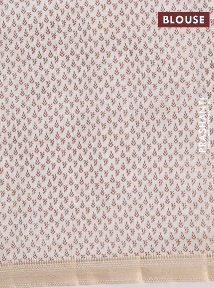 Semi raw silk saree cream with allover paisley butta prints and zari woven border