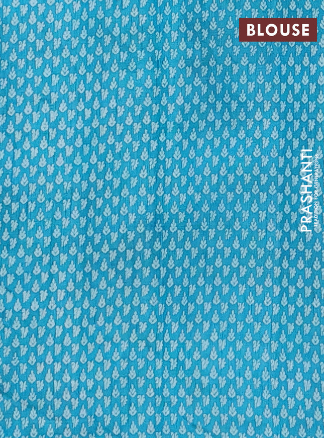 Semi raw silk saree teal blue with allover paisley butta prints and zari woven border