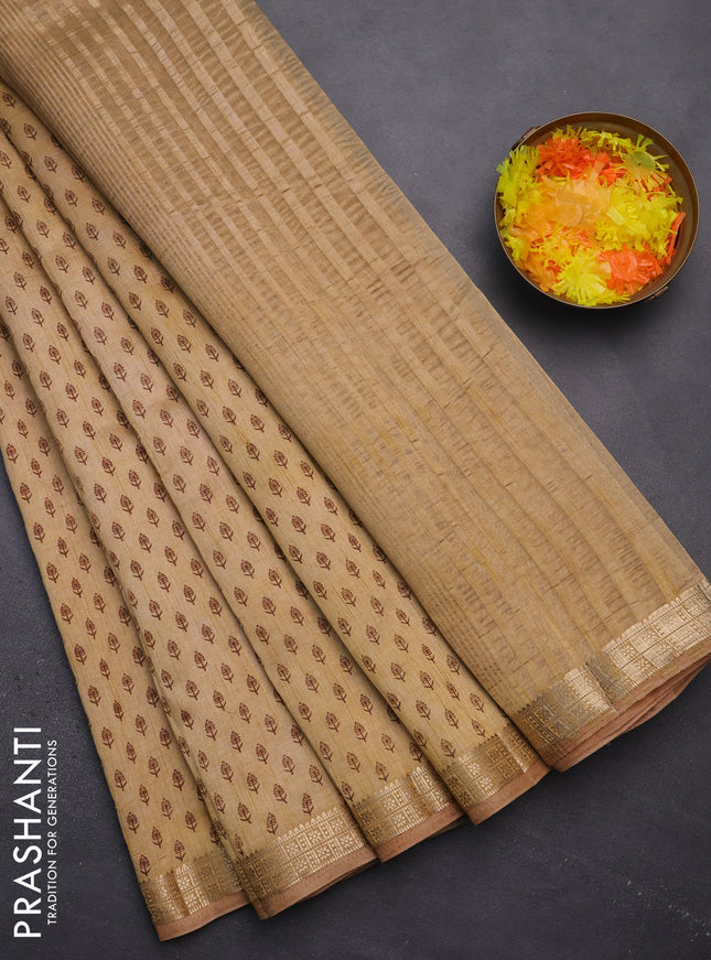 Semi raw silk saree sandal with allover butta prints and zari woven border