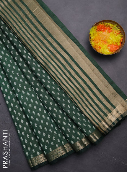 Semi raw silk saree green with allover butta prints and zari woven border