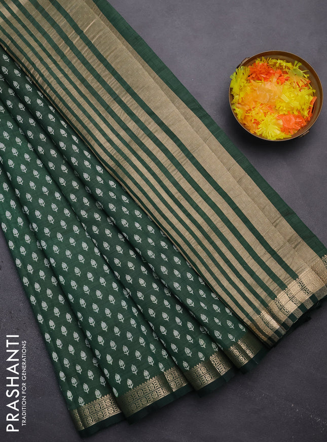 Semi raw silk saree green with allover butta prints and zari woven border