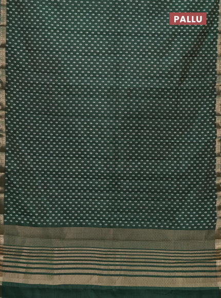 Semi raw silk saree green with allover butta prints and zari woven border