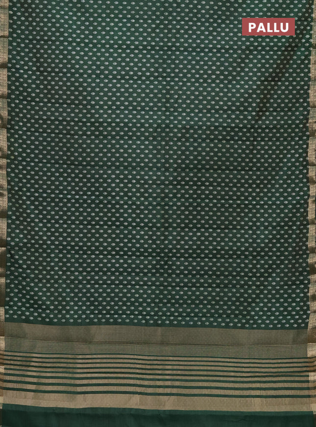 Semi raw silk saree green with allover butta prints and zari woven border