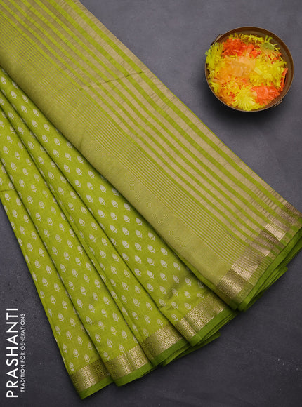 Semi raw silk saree fluorescent green with allover butta prints and zari woven border