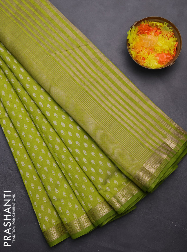 Semi raw silk saree fluorescent green with allover butta prints and zari woven border