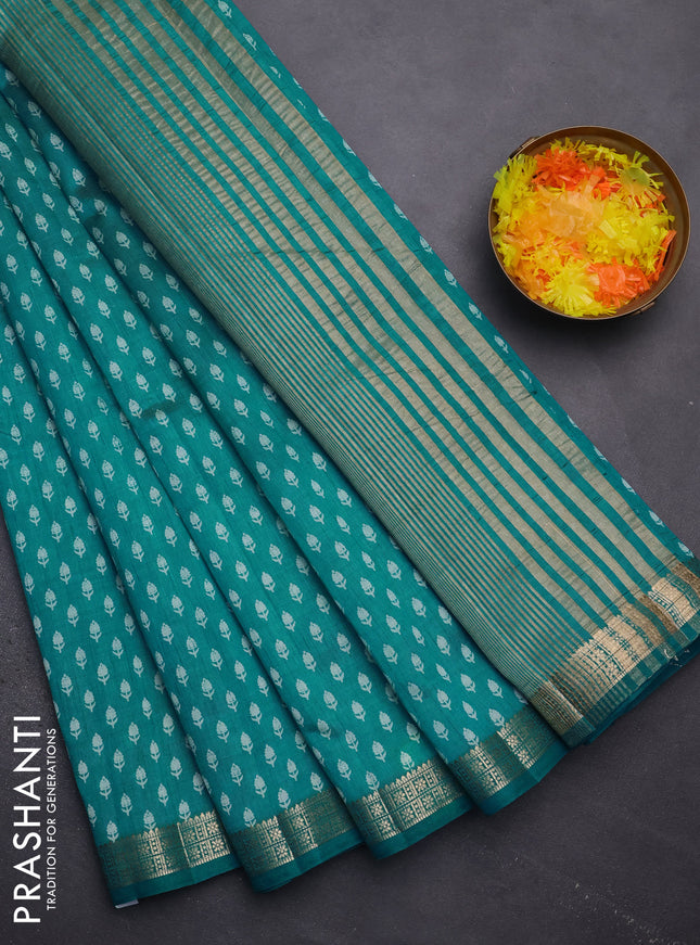 Semi raw silk saree teal blue with allover butta prints and zari woven border