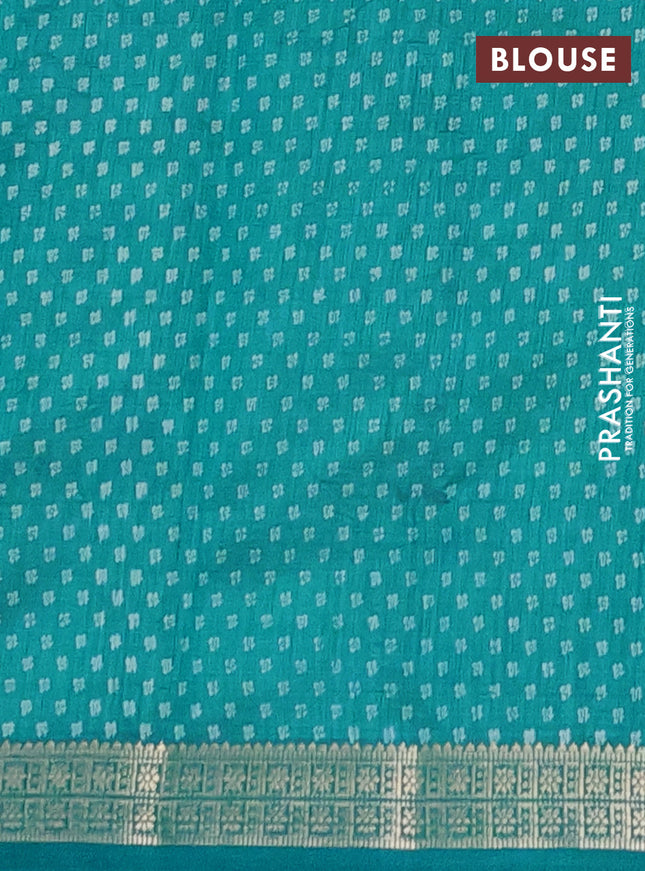 Semi raw silk saree teal blue with allover butta prints and zari woven border