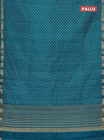 Semi raw silk saree teal blue with allover butta prints and zari woven border
