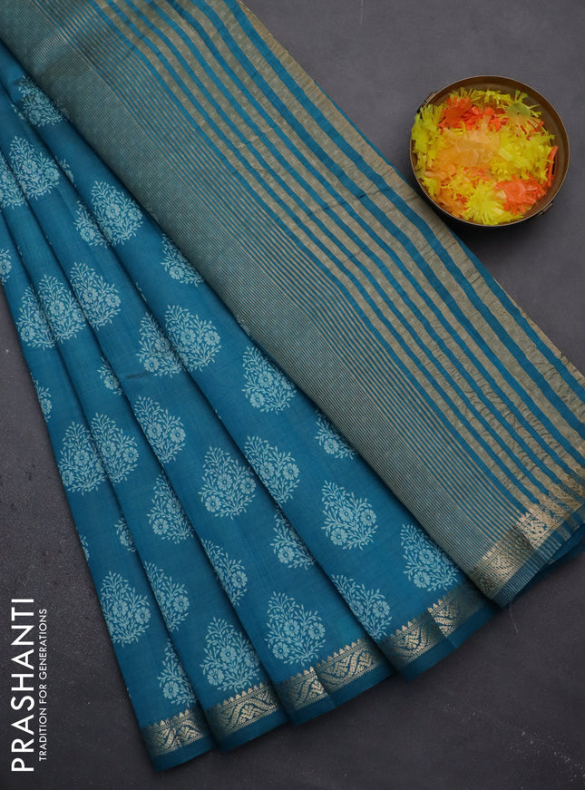 Semi raw silk saree cs blue with butta prints and zari woven border