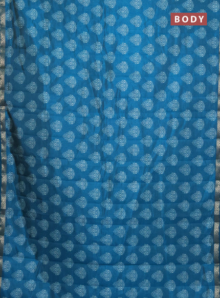 Semi raw silk saree cs blue with butta prints and zari woven border
