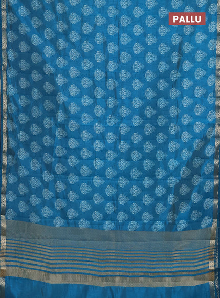 Semi raw silk saree cs blue with butta prints and zari woven border