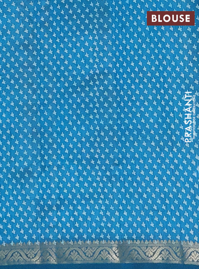 Semi raw silk saree cs blue with butta prints and zari woven border