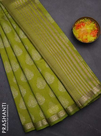 Semi raw silk saree light green with butta prints and zari woven border