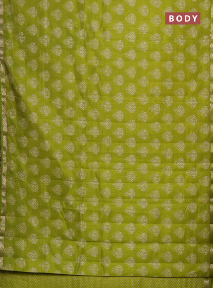 Semi raw silk saree light green with butta prints and zari woven border