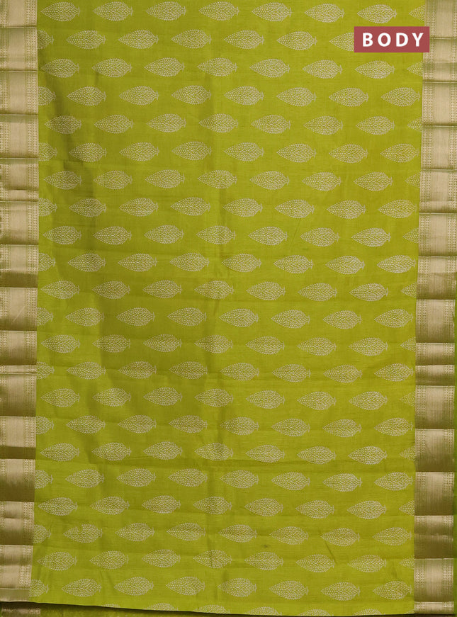 Semi raw silk saree light green with butta prints and zari woven border