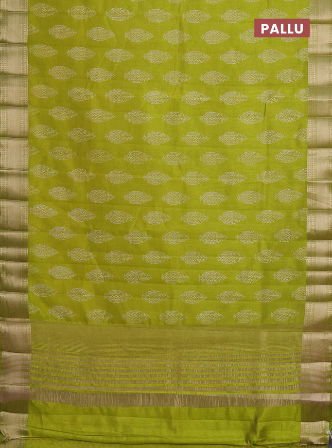 Semi raw silk saree light green with butta prints and zari woven border