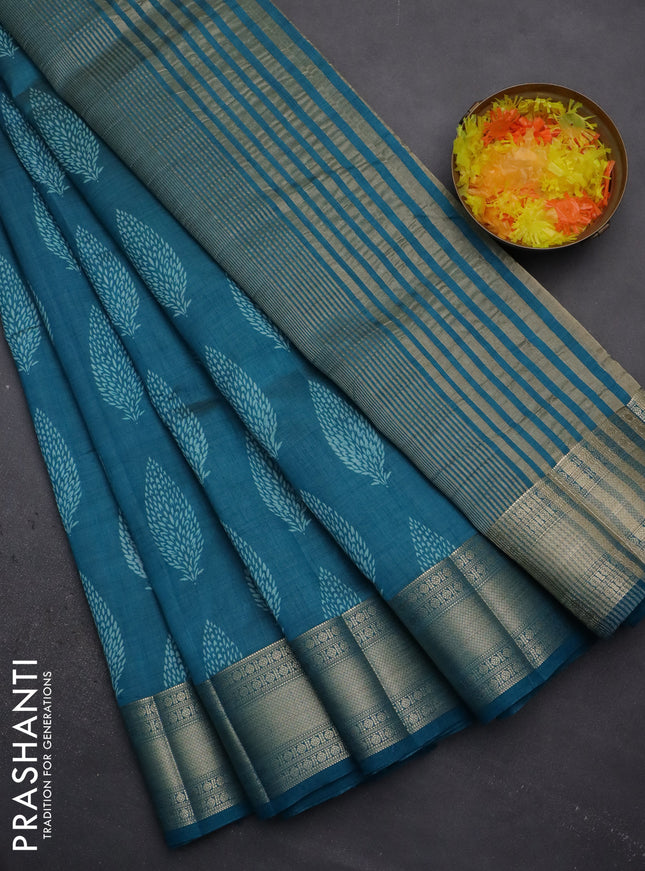 Semi raw silk saree cs blue with butta prints and zari woven border