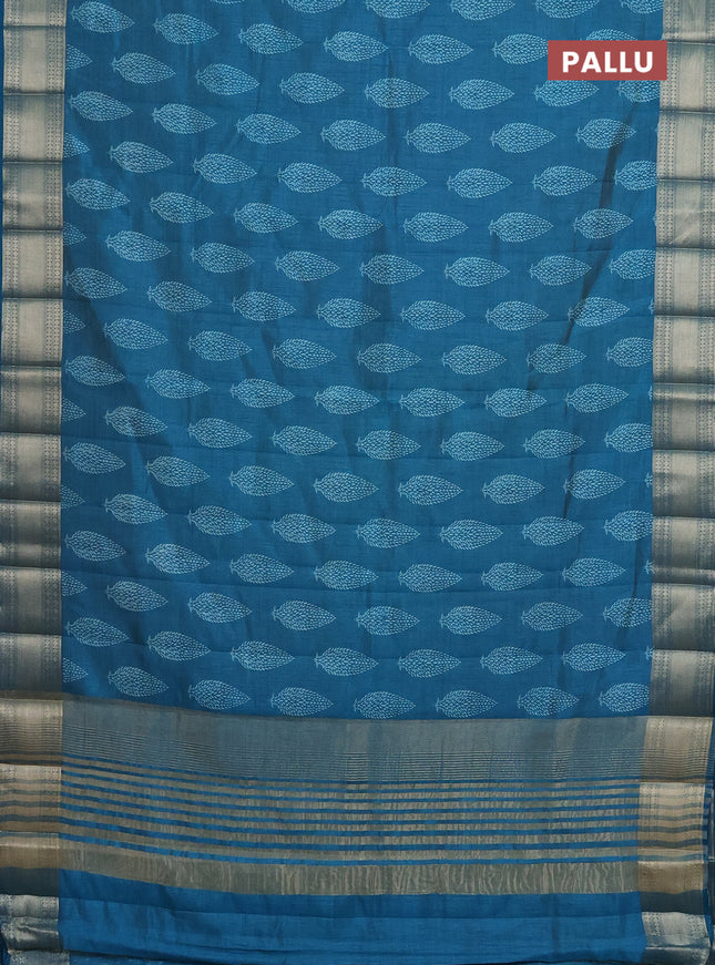 Semi raw silk saree cs blue with butta prints and zari woven border