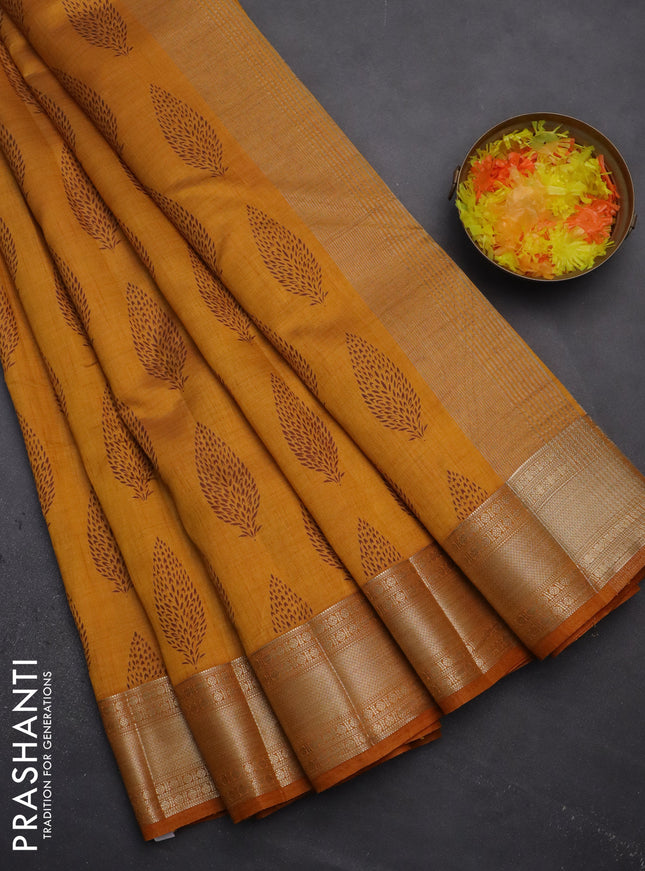Semi raw silk saree mustard yellow with butta prints and zari woven border