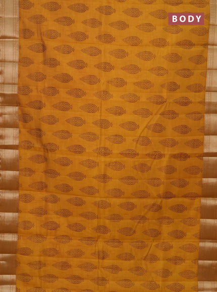 Semi raw silk saree mustard yellow with butta prints and zari woven border