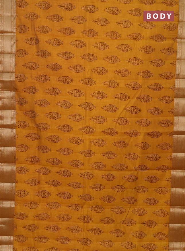 Semi raw silk saree mustard yellow with butta prints and zari woven border