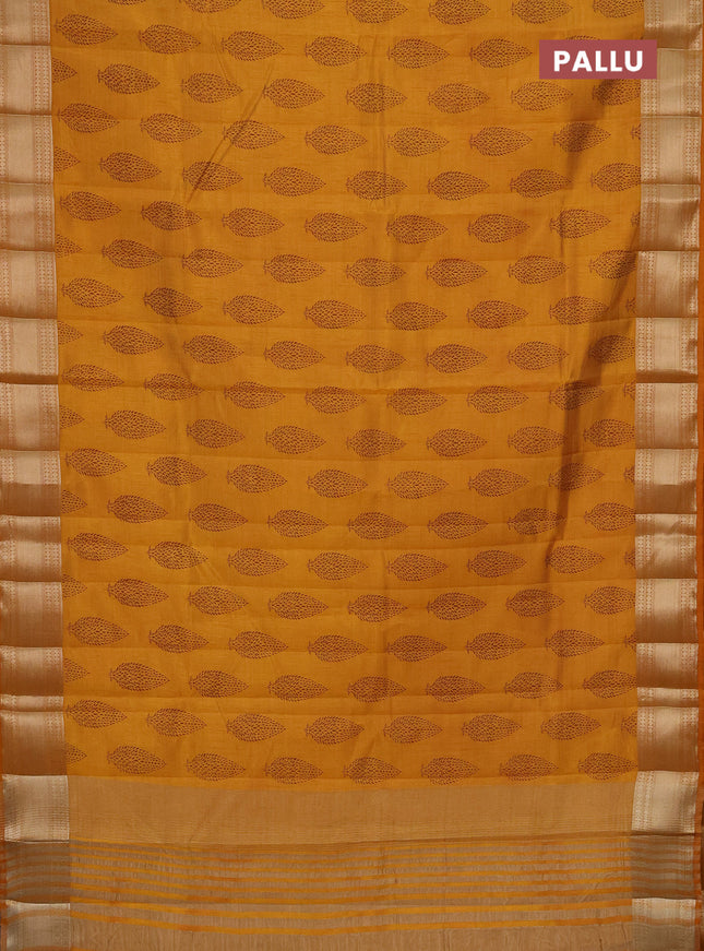 Semi raw silk saree mustard yellow with butta prints and zari woven border