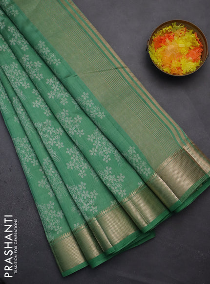 Semi raw silk saree green with butta prints and zari woven border