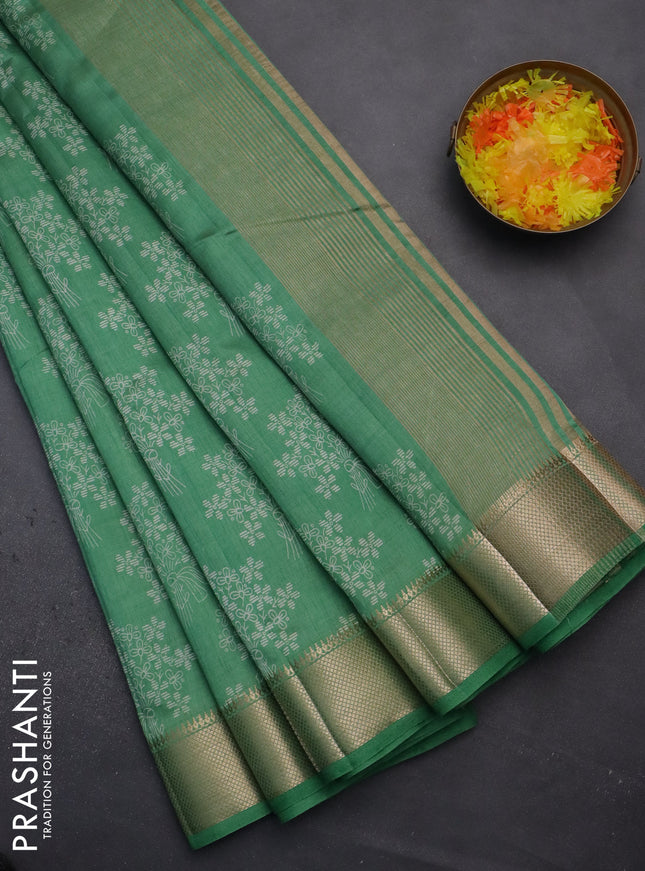 Semi raw silk saree green with butta prints and zari woven border