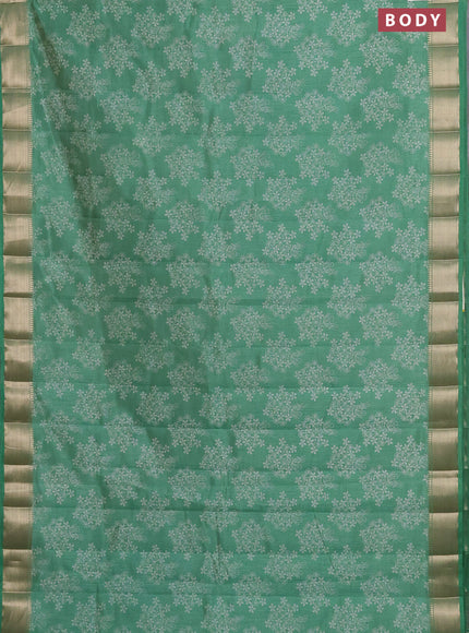 Semi raw silk saree green with butta prints and zari woven border