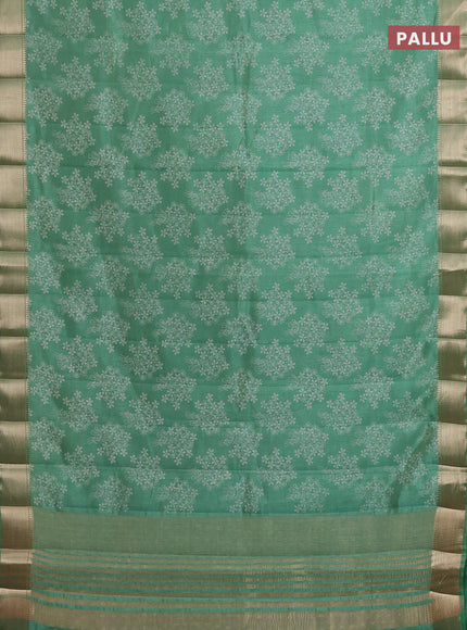 Semi raw silk saree green with butta prints and zari woven border