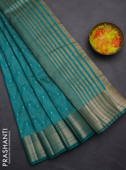 Semi raw silk saree teal blue with allover prints and zari woven border