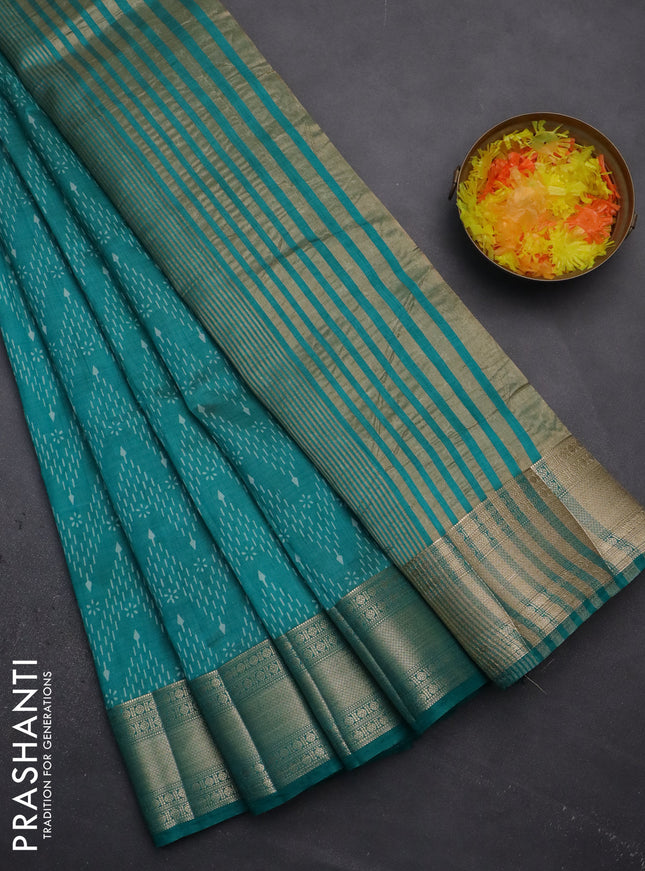 Semi raw silk saree teal blue with allover prints and zari woven border