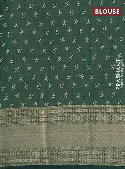 Semi raw silk saree green with allover prints and zari woven border