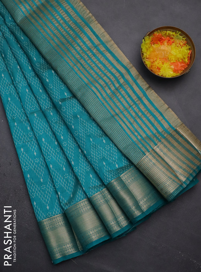 Semi raw silk saree teal blue with allover prints and zari woven border