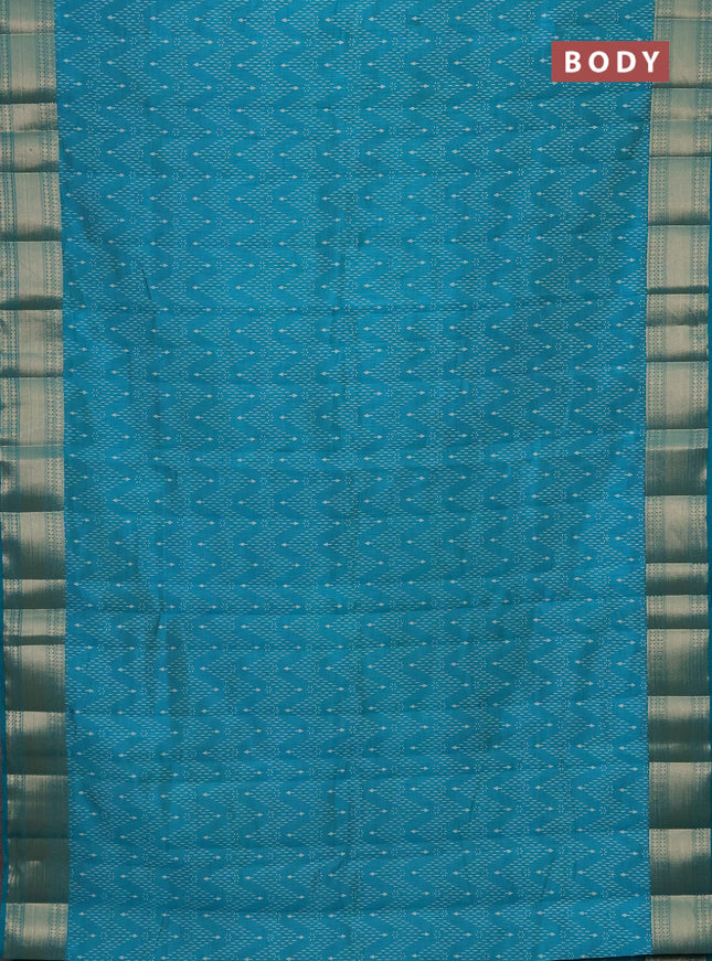 Semi raw silk saree teal blue with allover prints and zari woven border