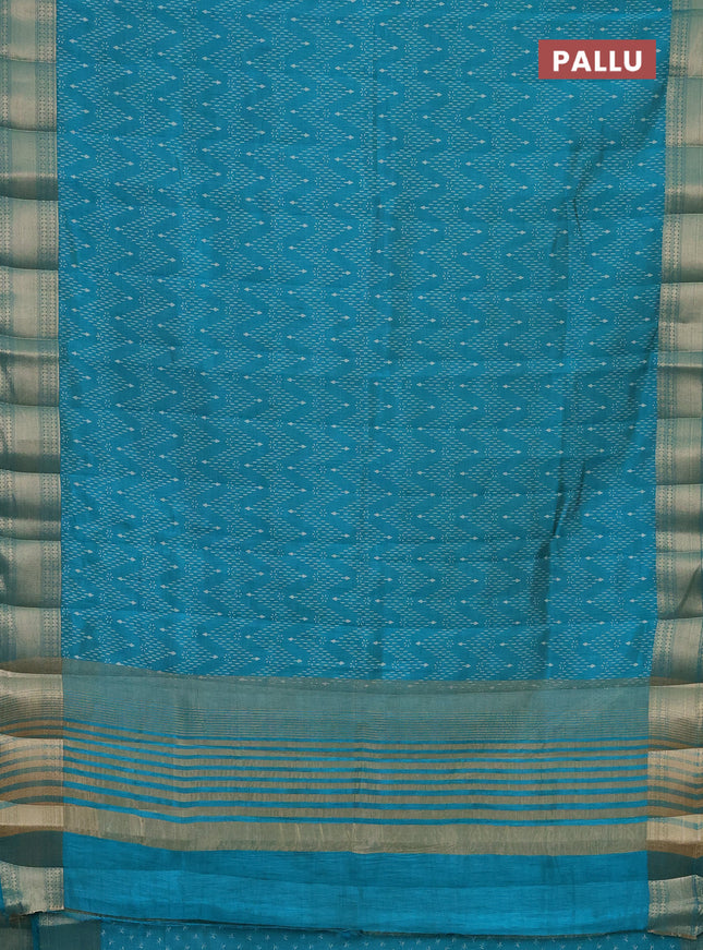 Semi raw silk saree teal blue with allover prints and zari woven border