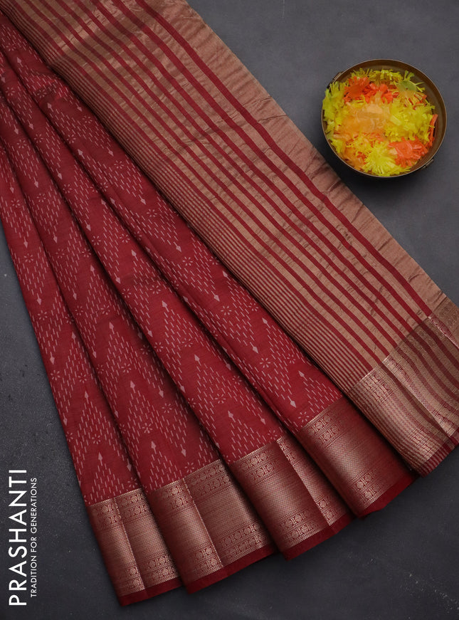 Semi raw silk saree maroon with allover prints and zari woven border