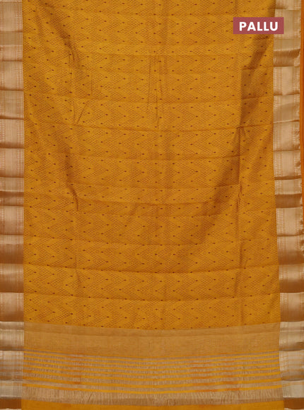 Semi raw silk saree mustard yellow with allover prints and zari woven border