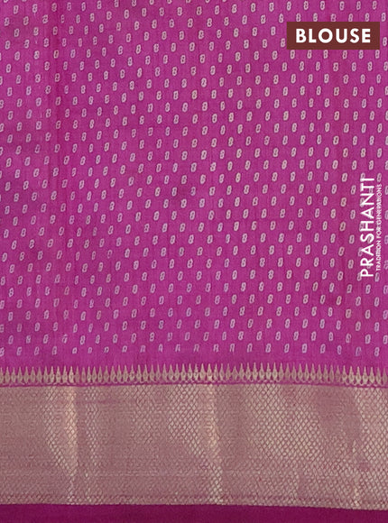 Semi raw silk saree purple with allover prints and zari woven border