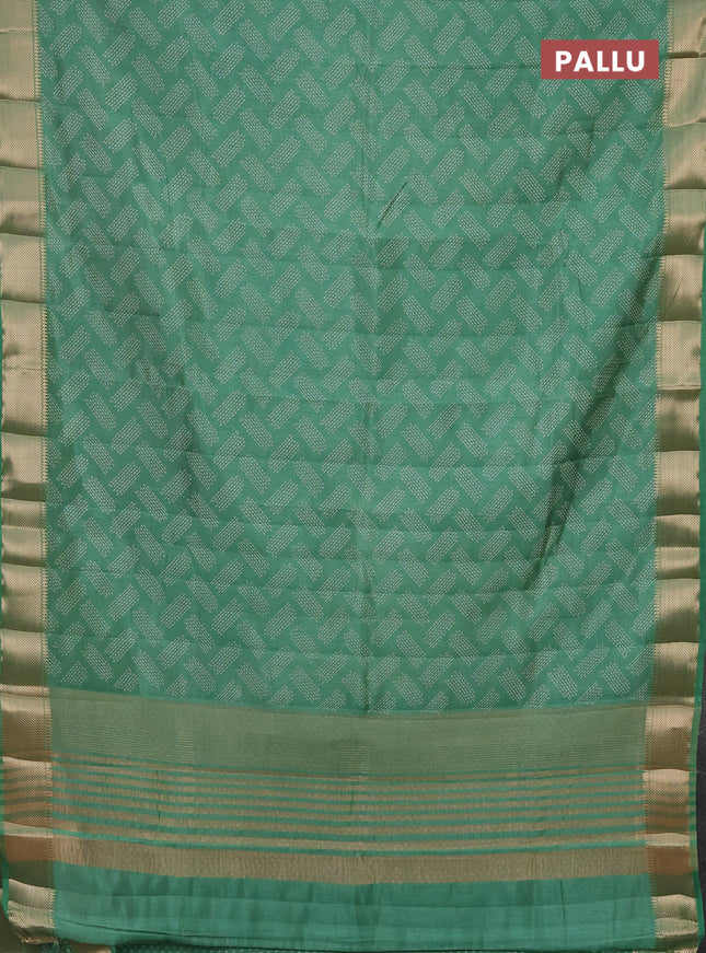 Semi raw silk saree teal green with allover prints and zari woven border