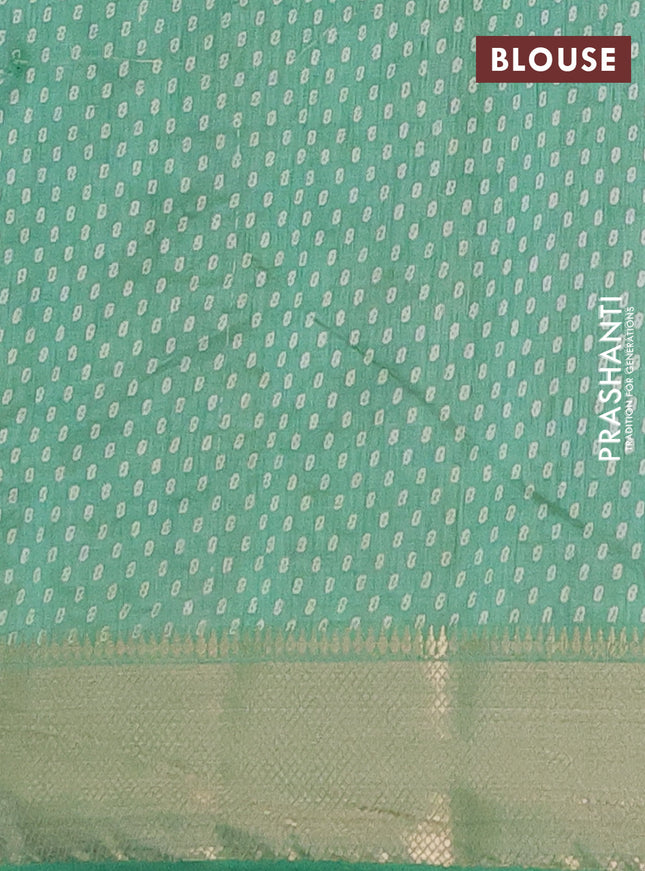 Semi raw silk saree teal green with allover prints and zari woven border
