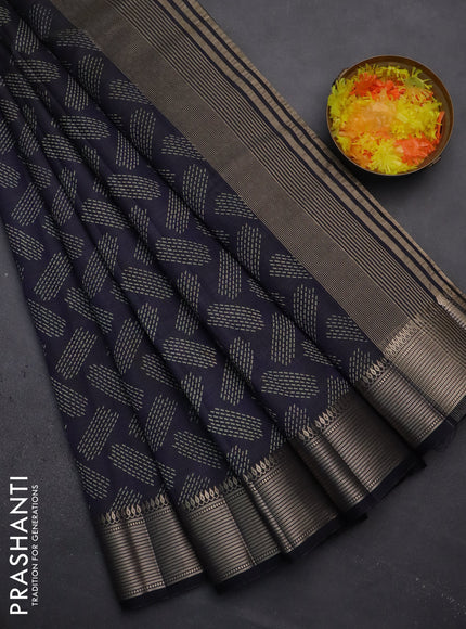 Semi raw silk saree navy blue with allover prints and zari woven border