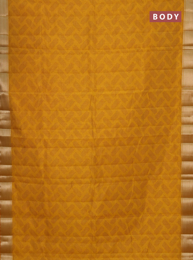 Semi raw silk saree mustard yellow with allover prints and zari woven border