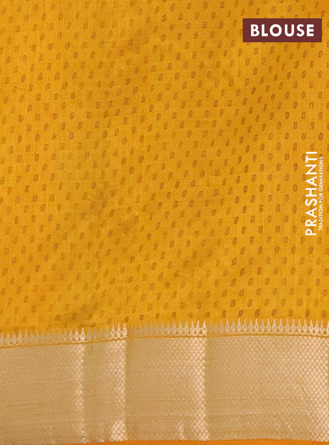 Semi raw silk saree mustard yellow with allover prints and zari woven border