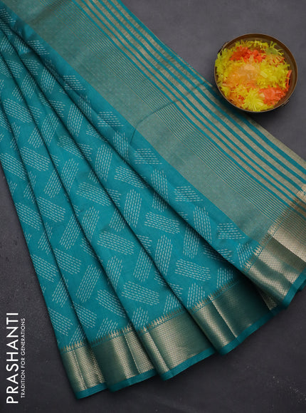 Semi raw silk saree teal blue with allover prints and zari woven border