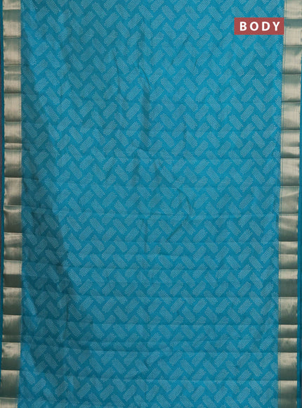 Semi raw silk saree teal blue with allover prints and zari woven border