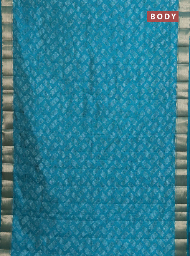 Semi raw silk saree teal blue with allover prints and zari woven border
