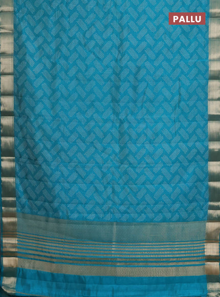 Semi raw silk saree teal blue with allover prints and zari woven border