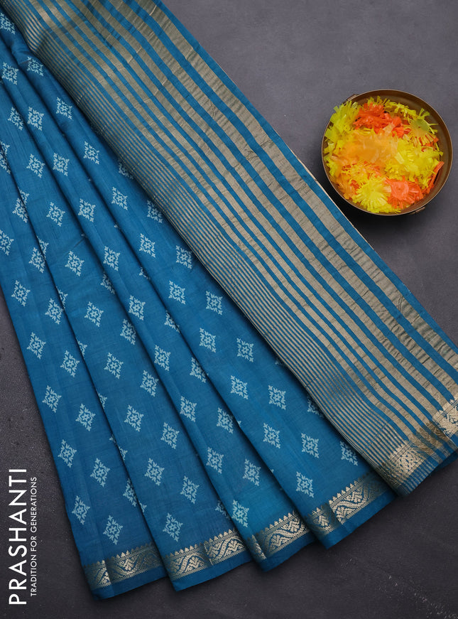 Semi raw silk saree cs blue with allover butta prints and zari woven border