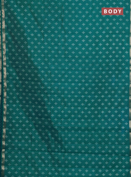 Semi raw silk saree teal green with allover butta prints and zari woven border